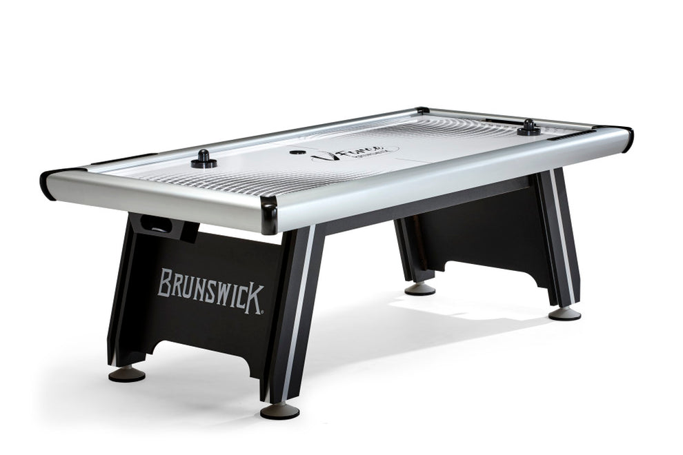 Brunswick V-Force 2.0 air hockey table, full view with strikers and pucks on the playfield